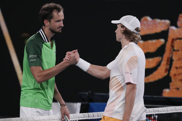 Daniil Medvedev  is congratulated by Emil Ruusuvuori following their second round match at the Australian Open.