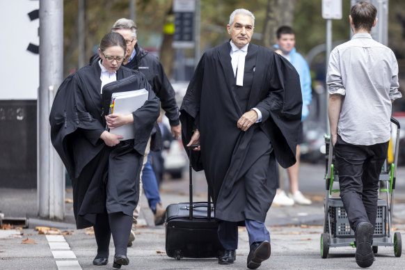 Crown prosecutors Kathryn Hamill and Daniel Porceddu arrive at court.