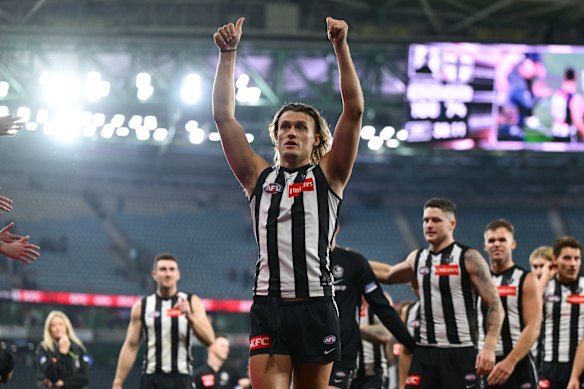 Magpies skipper Darcy Moore acknowledges the fans after the win over St Kilda.