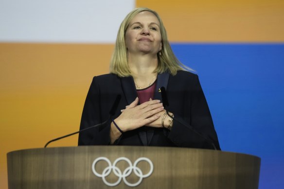 Kirsty Coventry reacts after she was announced as the new International Olympic Committee president.