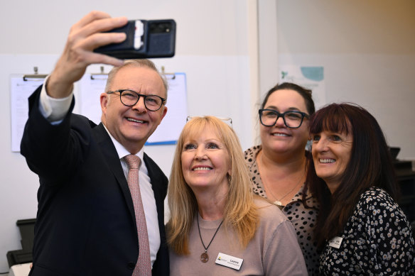 Albanese takes a photo with staff during a visit to a Medicare urgent-care clinic in Sunbury.