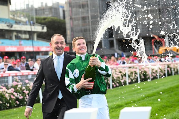 Jockey James McDonald and trainer Chris Waller celebrate Via Sistina’s Cox Plate win in 2024.