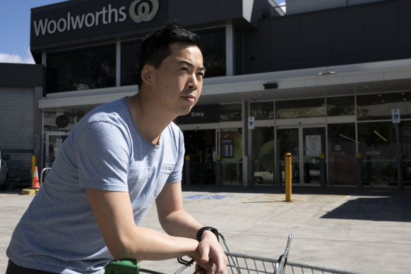 Andrew Wong outside his local Woolworths in Alexandria, Sydney, which is set to become a Metro store, angering residents.