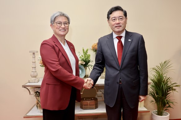 Penny Wong with her former Chinese counterpart, Qin Gang.