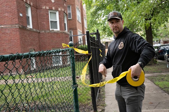 Crime scene tape is stretched across the front of a building where shooting suspect Elias Rodriguez lived.