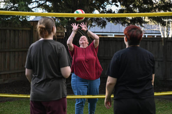 Heidi Ryan plays volleyball with her children in their Langwarrin backyard. 