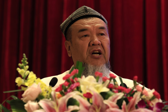 Abdureqip Tomurniyaz, who heads the association and the school for Islamic studies in Xinjiang, speaks during a government reception held for the Eid al-Fitr festival in Beijing.