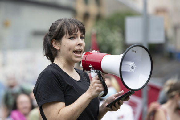 Better Read than Dead employee and RAFFWU member Emma Cooper addresses about 110 people at a rally to support union action.