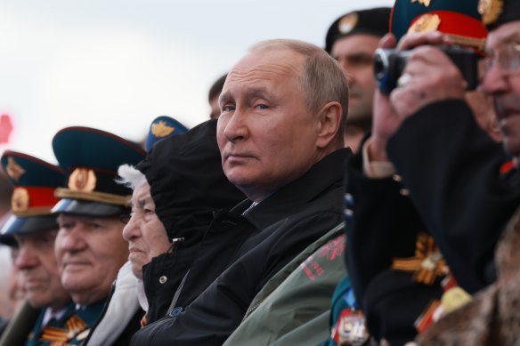 Russian President Vladimir Putin watches the Victory Day military parade in Moscow.