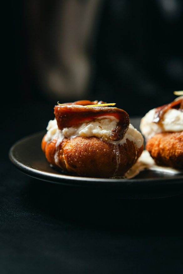 Anchovy, goats curd on Hungarian fried dough. 