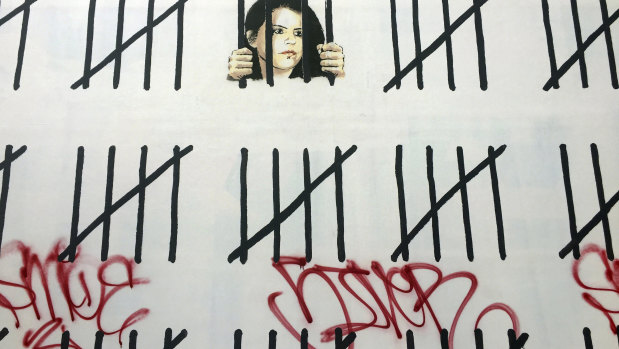 Graffiti painted on top of a mural in New York by British graffiti artist Banksy protesting the imprisonment of Turkish artist and journalist Zehra Dogan.