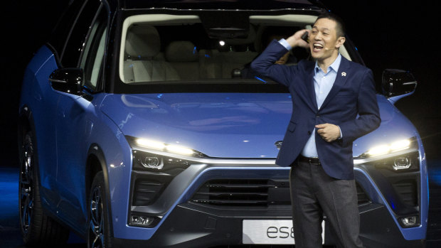 William Li, founder and chairman of Chinese automaker NIO launches the NIO ES8 electric SUV at an event in Beijing in December.