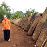 A fence made from US cluster bomb casings.