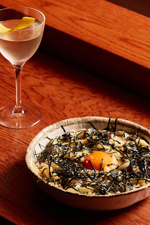 The miso-y udon carbonara towsthe line between Japanese and Italian, with a shoyuzuke (soy-sauce pickled) egg yolk.  