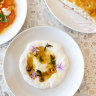 Oxheart tomato and goat’s curd salad with stracciatella and focaccia.