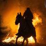 ‘Bless them’: Horses jump bonfires for purification