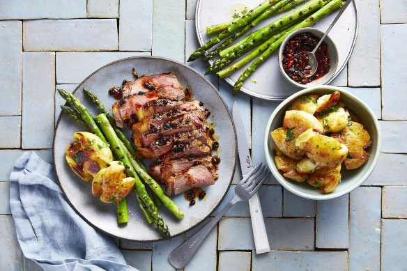 Steak with store-bought crispy chilli oil and simple sides is a midweek favourite.