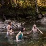 Take an icy plunge in North West Bay River.