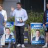 Liberal candidate, Nathan Conroy, greets voters alongside Deputy Liberal leader Sussan Ley at a polling booth in Carrum Downs.