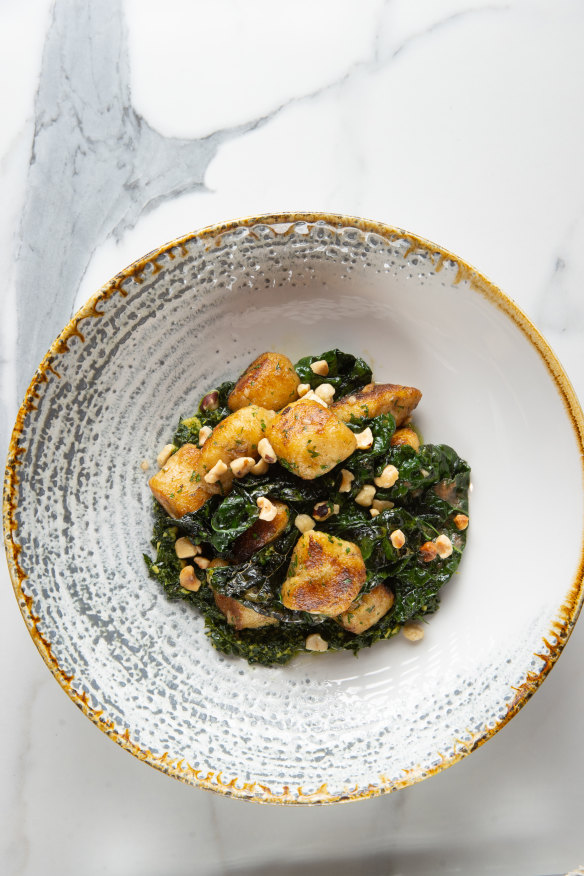 Gnocchi with toasty hazelnuts and buttered cavolo nero.