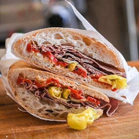 A cross-section of Il Manzo (roast beef) which requires two hands to tackle.
