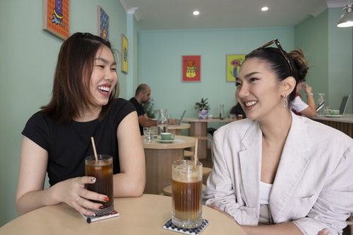 Cookie Boonhoi and Maima Thanawarankul drink a Cold Brew and Espresso Yuzu Fizz at Ickle Coffee in Kingsgrove.