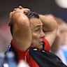 Shane Flanagan watches on as the Dragons slump to defeat against Manly on Friday night.