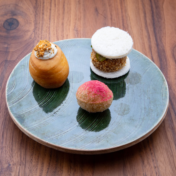 Pani puri filled with duck parfait and raspberry; duck katsu sandwich; and a doughnut cooked in duck fat at Underbar in Ballarat.