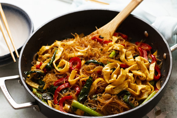 Stir-fried glass noodles with egg ribbons.