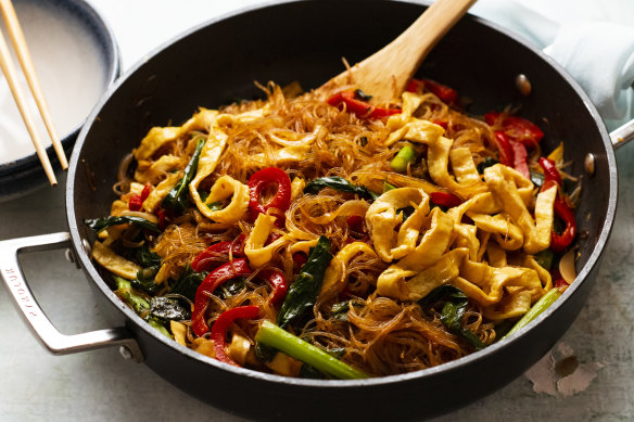 Stir-fried glass noodles with egg ribbons.