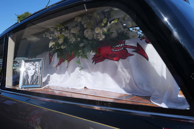 The hearse draped with a Welsh flag ahead of the funeral of Bonnie Tyler.