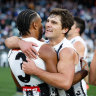 Magpies Isaac Quaynor and Lachie Schultz after their side’s thrilling win.