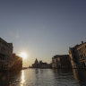 A deserted Gran Canal in Venice in early April. The waters of the city are now clear, as boats no longer churn up the mud.