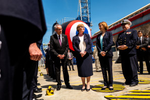 Thoroughly charmed: French President Emmanuel Macron made sure then defence minister Linda Reynolds, seen here with her French counterpart Florence Parly, was invited to the launch of the first of France’s newest class of nuclear-powered submarines, the Barracuda, in Cherbourg in 2019. 