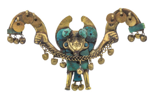 A gold and turquoise nose ornament from the exhibition.