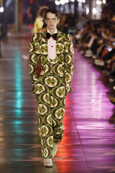 Rising star: Kodi Smith-McPhee models in a Gucci fashion show last year.