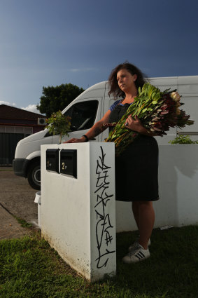 Jessica Eckford-Aguilera and her vandalised letterbox.