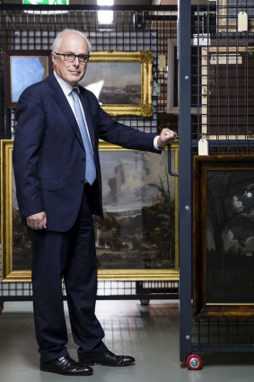 State Librarian Dr John Vallance with some of the 300 valuable paintings that are about to go on display in October. 