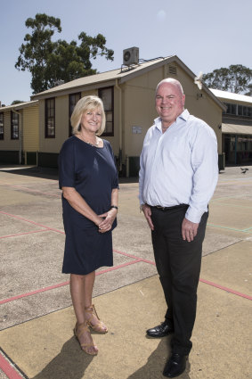 Deputy principal Kim Cootes and principal David Smith in the playground of Sydney’s Fairfield Public School.