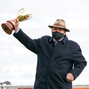 Trainer Peter Moody celebrates the win by Incentivise.