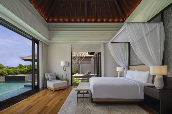 A villa room and its pool.