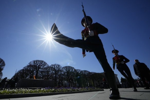 Honour guard soldiers march at the Piskaryovskoye Cemetery in St Petersburg, where victims of the Siege of Leningrad were buried during WWII. 