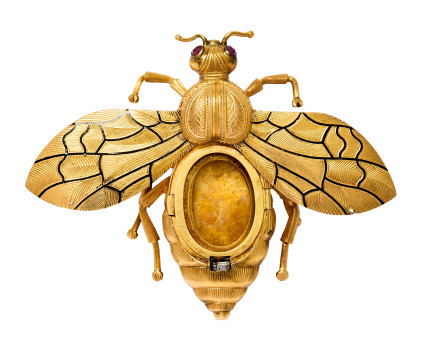 Victorian 18ct gold, enamel and ruby bee locket brooch being sold by Annemie Stein.