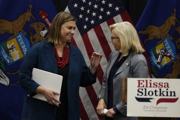 Democrat Elissa Slotkin, left, with Republican Liz Cheney at a campaign rally in East Lansing, Michigan.