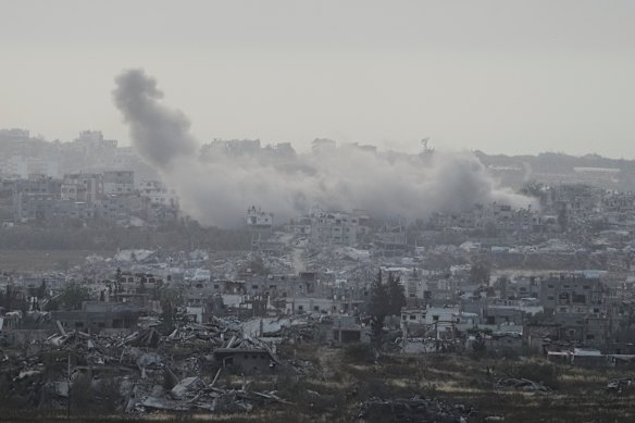 Smoke rises after an Israeli airstrike in northern Gaza on Friday.