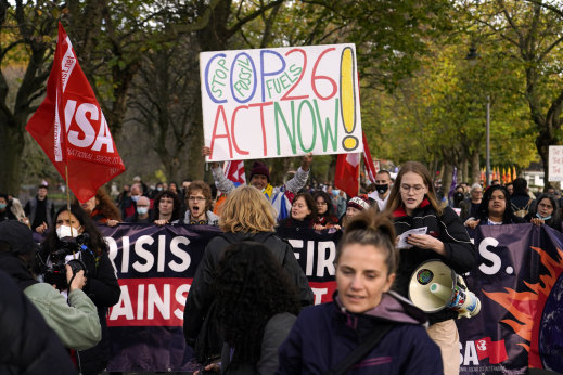 Activists march through the streets of Glasgow, host city of the United Nations’ COP26 Climate Summit in 2021.