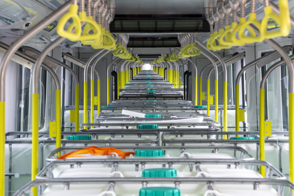 Tanks, each carrying 1000 litres of water, simulate the weight of people on board a Sydney Metro train.