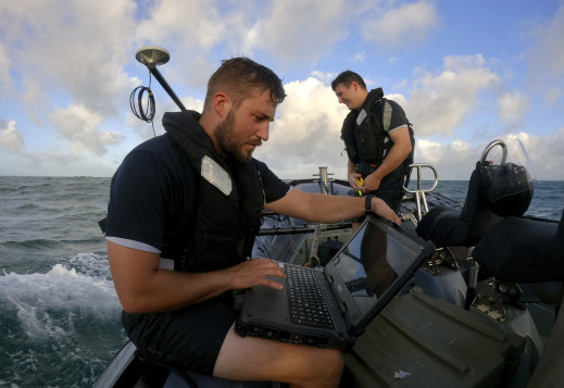 A hydrographic survey and dive team from HMNZS Wellington inspect the coastal waters off Tonga after a volcano eruption. The single undersea fibre optic cable which connects the Pacific nation to the outside world was severed after the eruption and tsunami. 