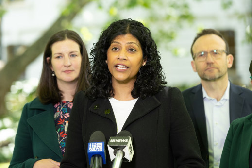 Greens leader Samantha Ratnam (centre) with Melbourne MP Ellen Sandell and federal party leader Adam Bandt.