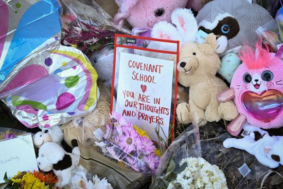 A memorial to victims at Covenant School in Nashville. The US had almost one school shooting per week last year.